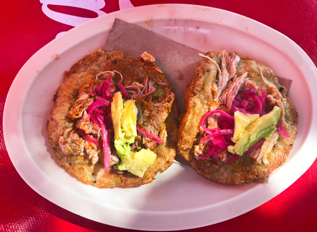 Panuchos.. Don't leave Mexico without having one.